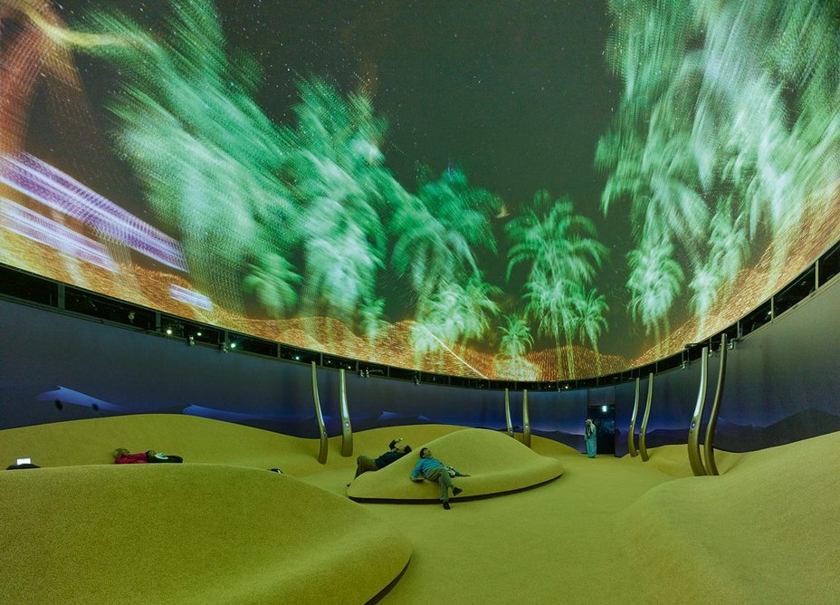 A domed hall in Kuwait’s pavilion envelops visitors in a projection of a starry desert sky.