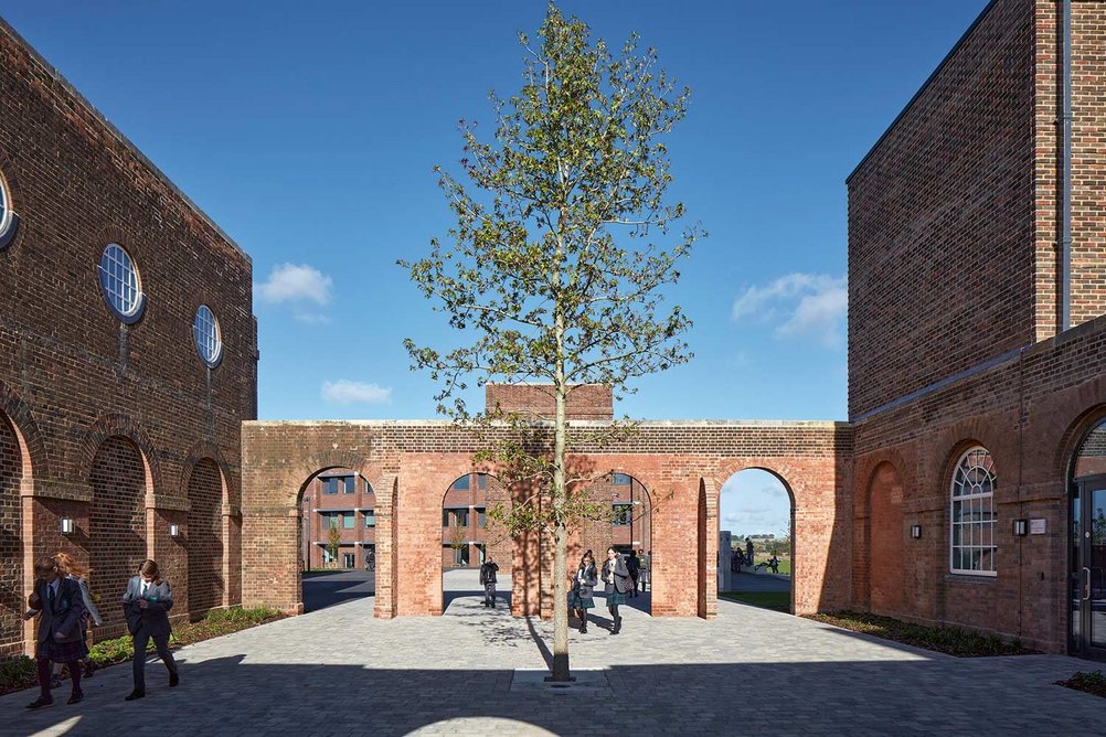 The water tower and playground looking north with new teaching block beyond.