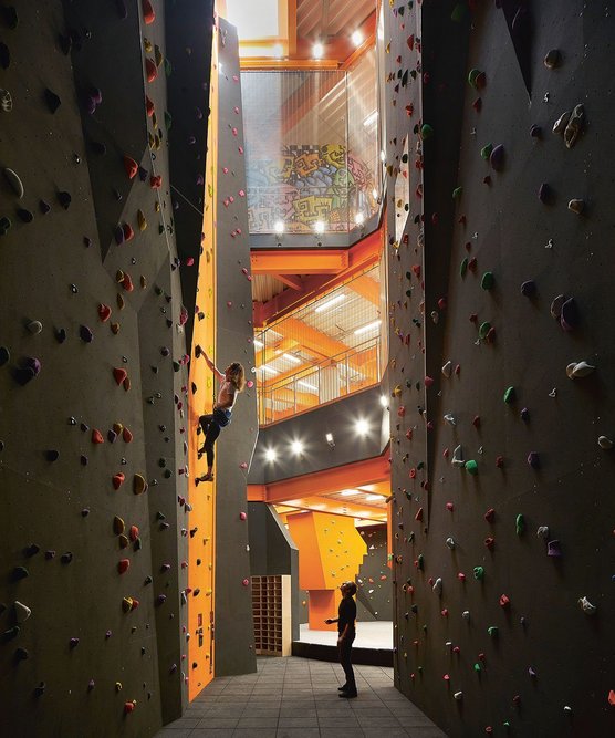 The 15m-tall climbing wall soars through three floors while a bouldering area is at the back.