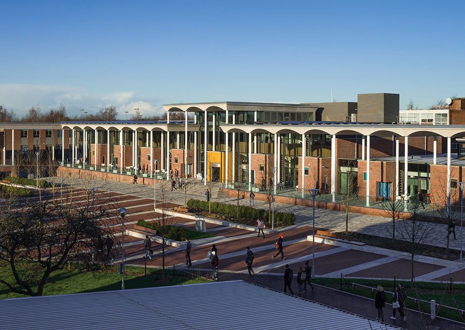 The module of the pavilion building extends across the landscaped piazza.