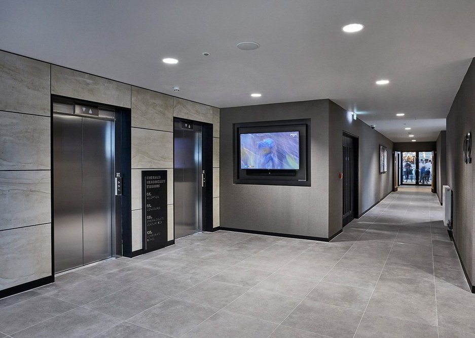 Easy to maintain, anti-slip Eco Concrete tiles by Casalgrande Padana were chosen for the stadium's communal and entrance areas.