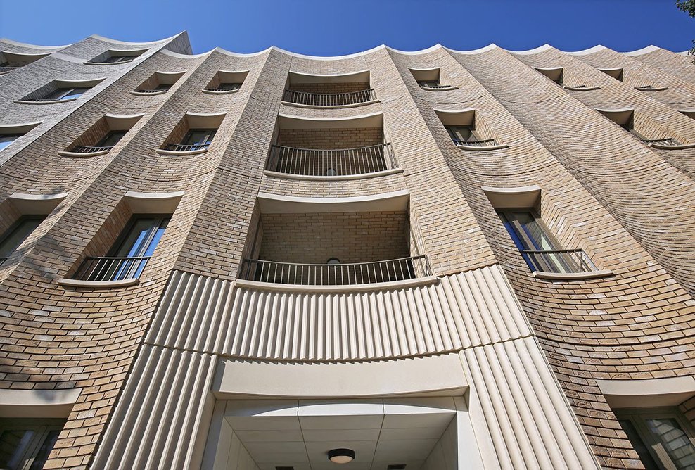 Curved panels with Vandersanden Woodland Mixture facing bricks ensure the building complements and blends with the streetscape.