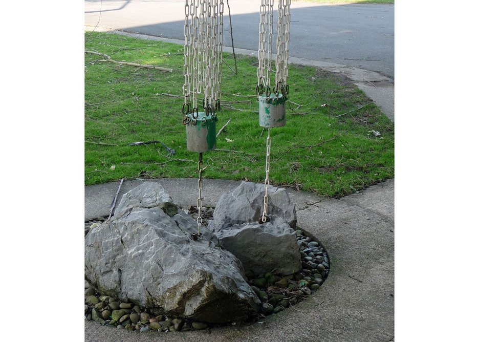 Rainwater splashed onto artfully placed rocks