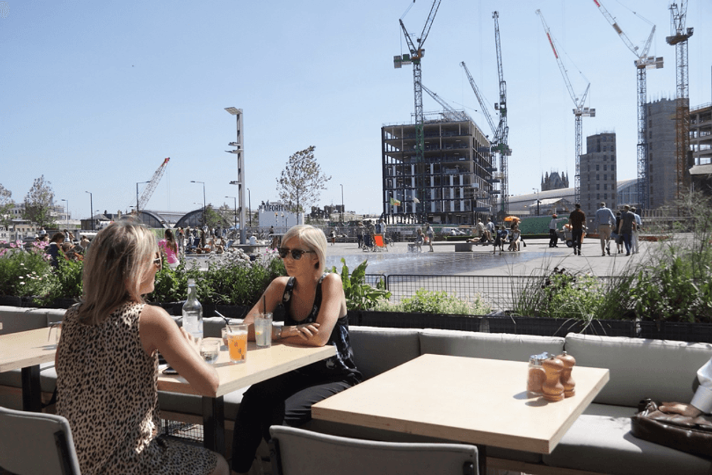 Granary Square was completed and in use while other elements of the masterplan were going up around it.