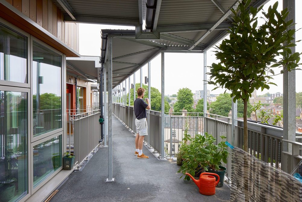 Access decks  incorporate ‘patio’  spaces, each shared by two homes.