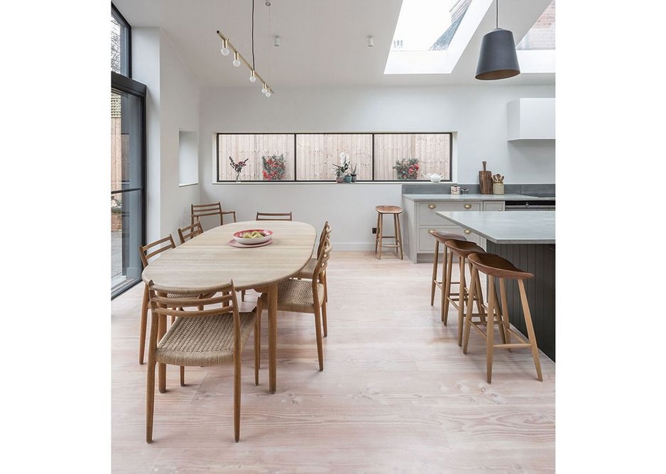 View across the High Contrast House extension. Its timber floorboards are pleasingly wide.