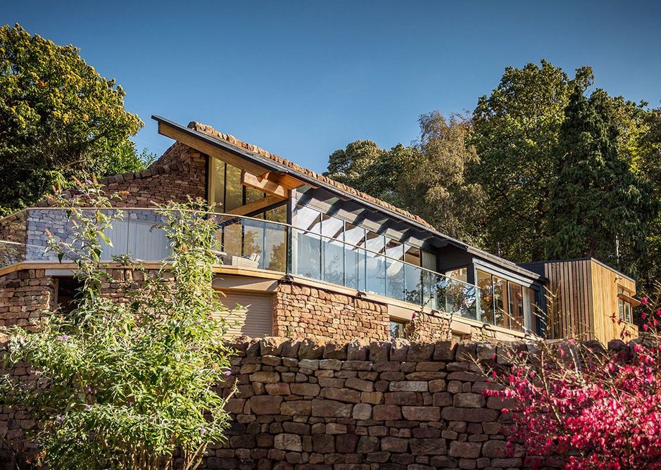 Three level house with bedrooms on ground floor and living area and study above.