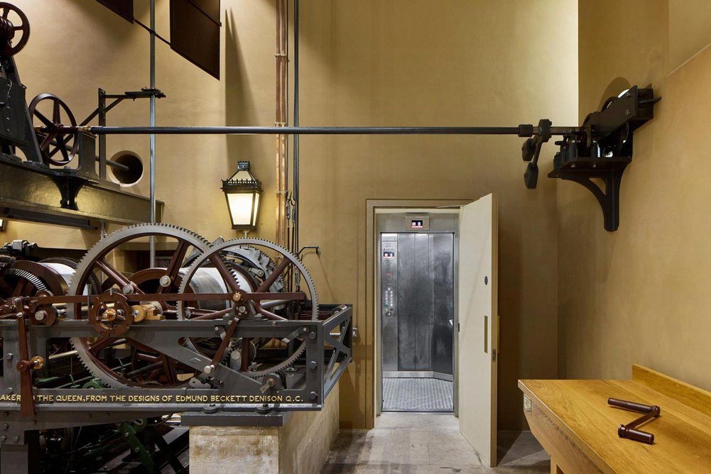 View of the main passenger lift and the tower’s clock mechanism.