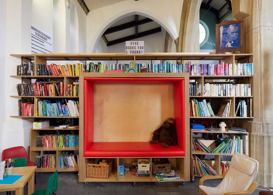 Snug place for kids reading. Like most of the fittings, it can be wheeled around.