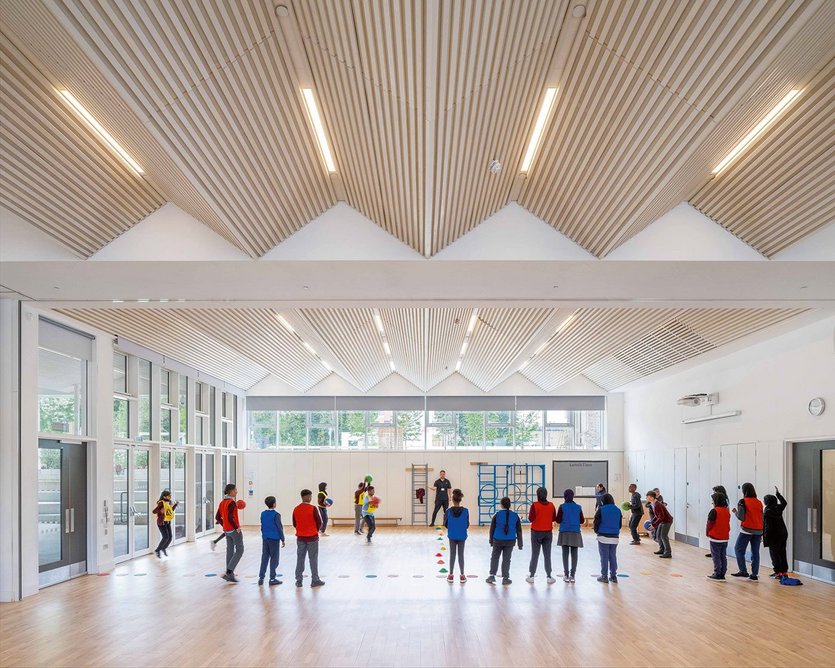 The hall, like all ground-floor rooms, has a folded timber ceiling.