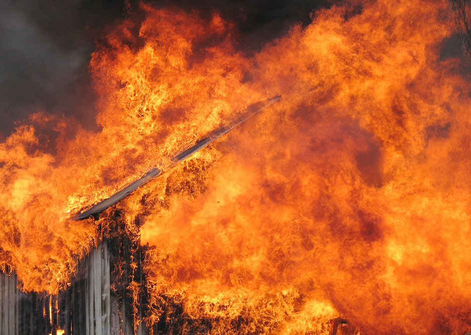 The intense heat of a blaze in a historic building.