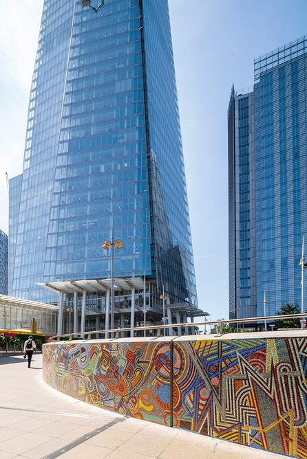 The mural is located close to The Shard, which is one of the many local buildings referenced in Adam Nathaniel Furman’s design.