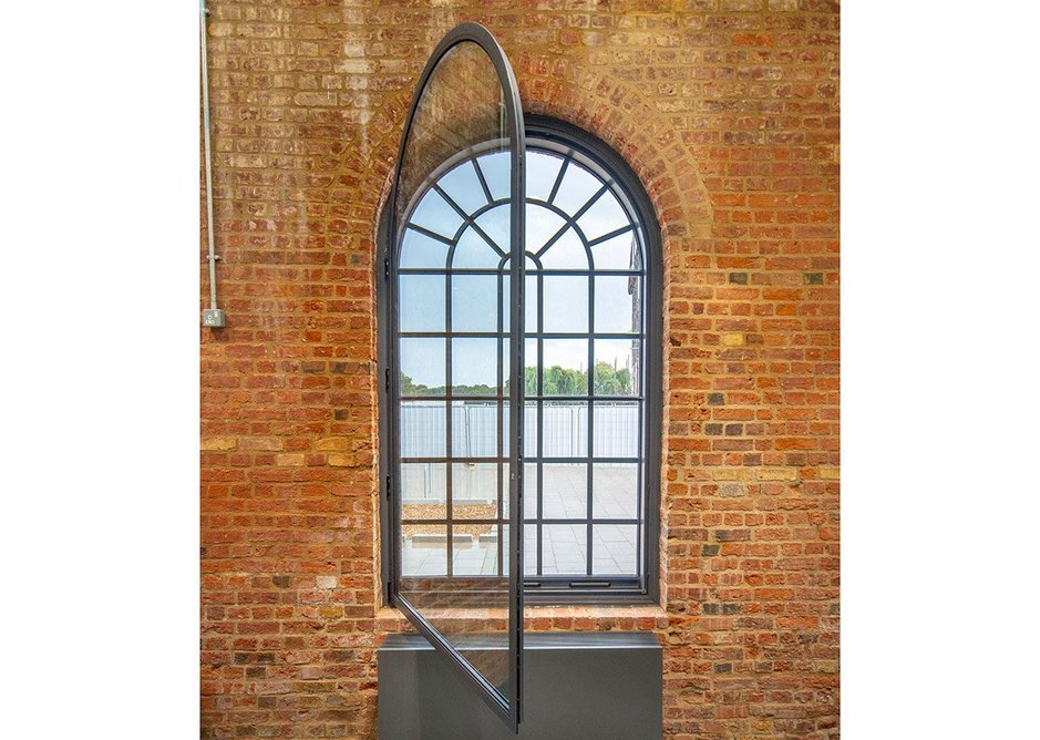 Arched hinged secondary window with argon filled 28mm double glazed unit to reduce heat loss.