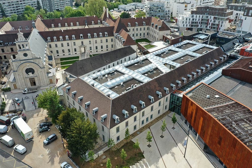 View of Le Village - the new pop-up concept food shopping area in the covered area of a courtyard.