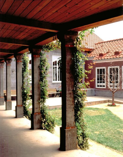 The Julian Street Inn, a shelter for the homeless in San Jose, California, designed with Gary Black and Eleni Coromvli. Completed in 1990, the building features open lacework trusses, hand-made column capitals and a hand-painted tile exterior.
