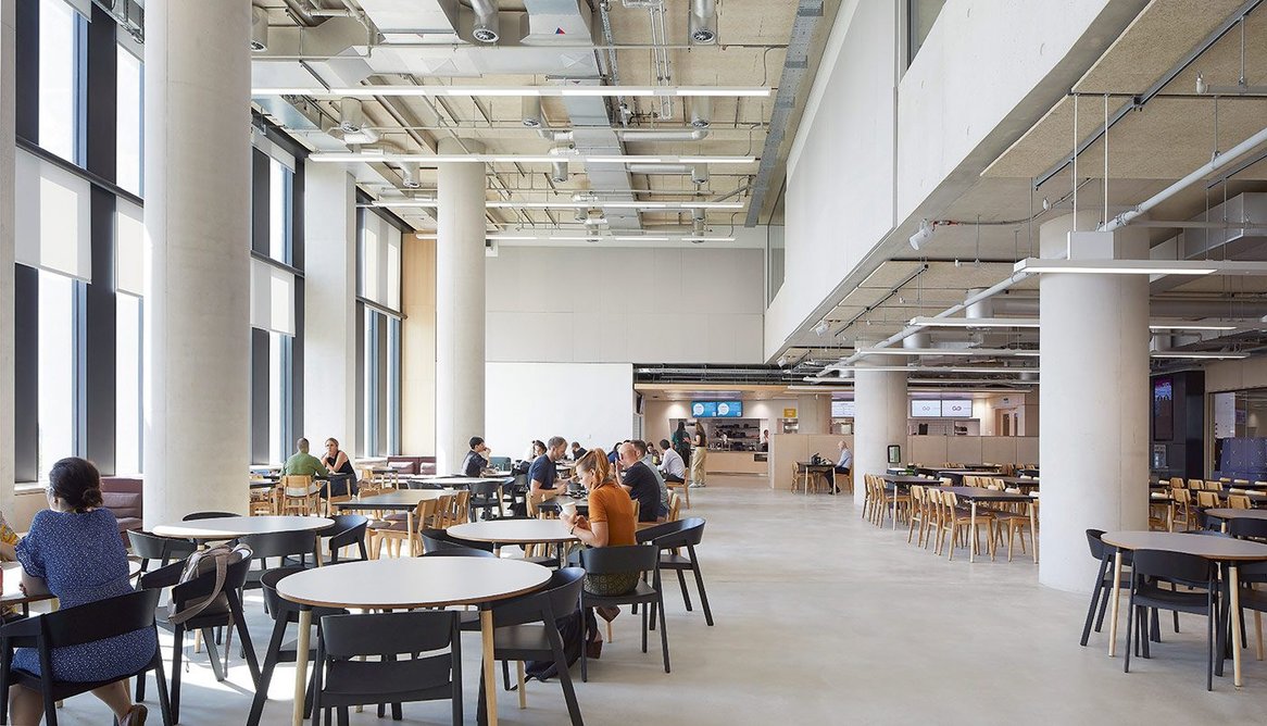 Lofty student refectory on level three. Staff get their own equivalent on the top.
