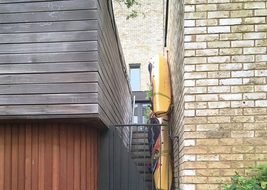 Signs of life: a rear staircase repurposed as boat storage