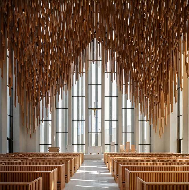 Interior of the church showing the aisle and altar.