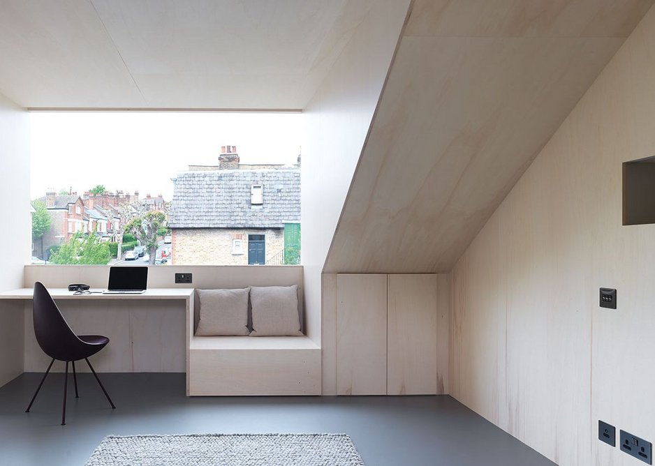 Loft at Stapleton Hall Road, London, united by pale poplar ply.