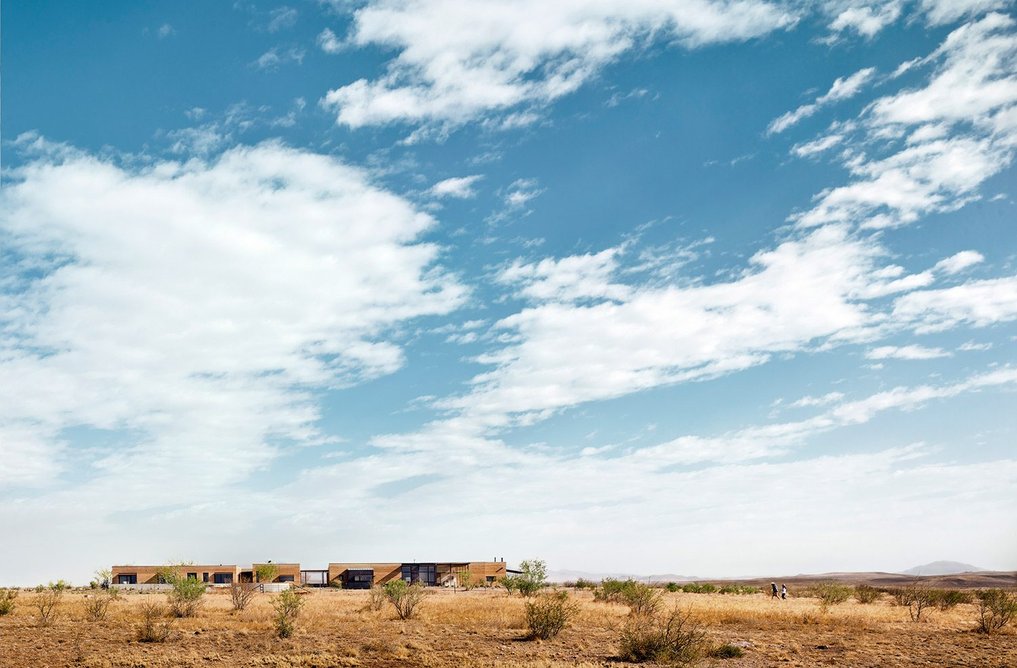 Marfa Ranch (2020) connects to desert grasslands with lightweight breezeways and porches.