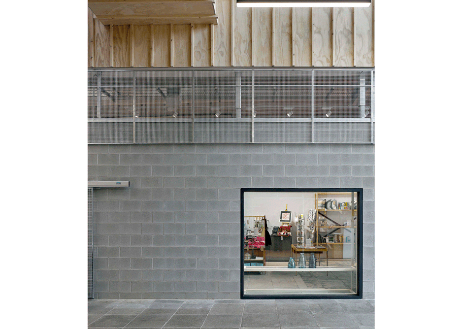 A restrained materials palette – plywood, blockwork and mesh – made maximum use of the budget, while internal windows allow maximum visibility
