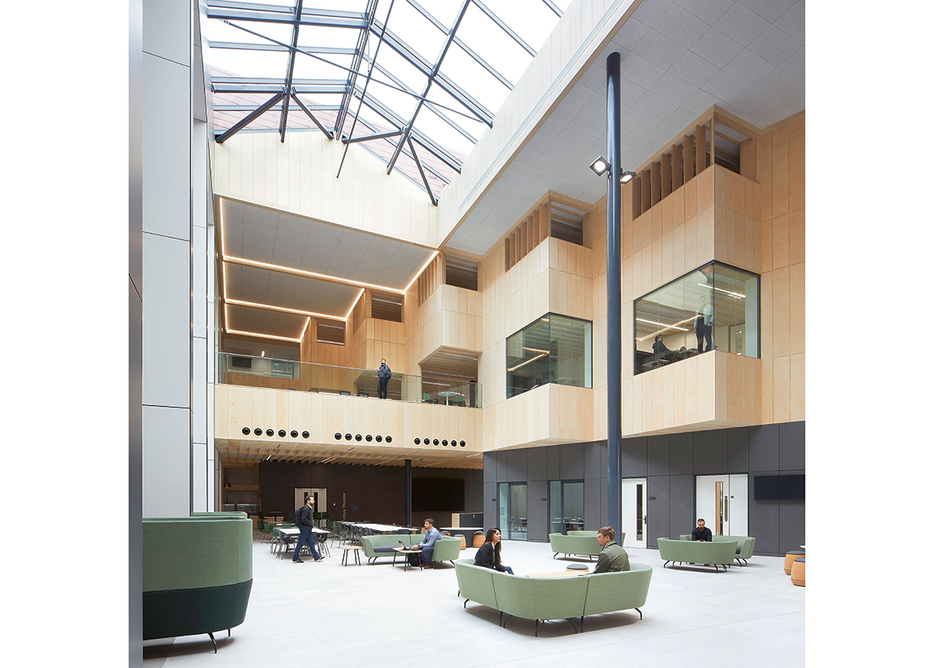 Workstations populate the open areas at first and second floors on the atrium’s north side, with seminar and workstation areas on the east.