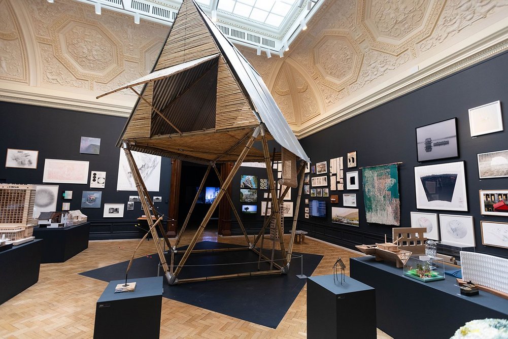 Marina Tabussum’s Khudi Bari (Tiny House) flood shelter is the focal point of the Weston Room.