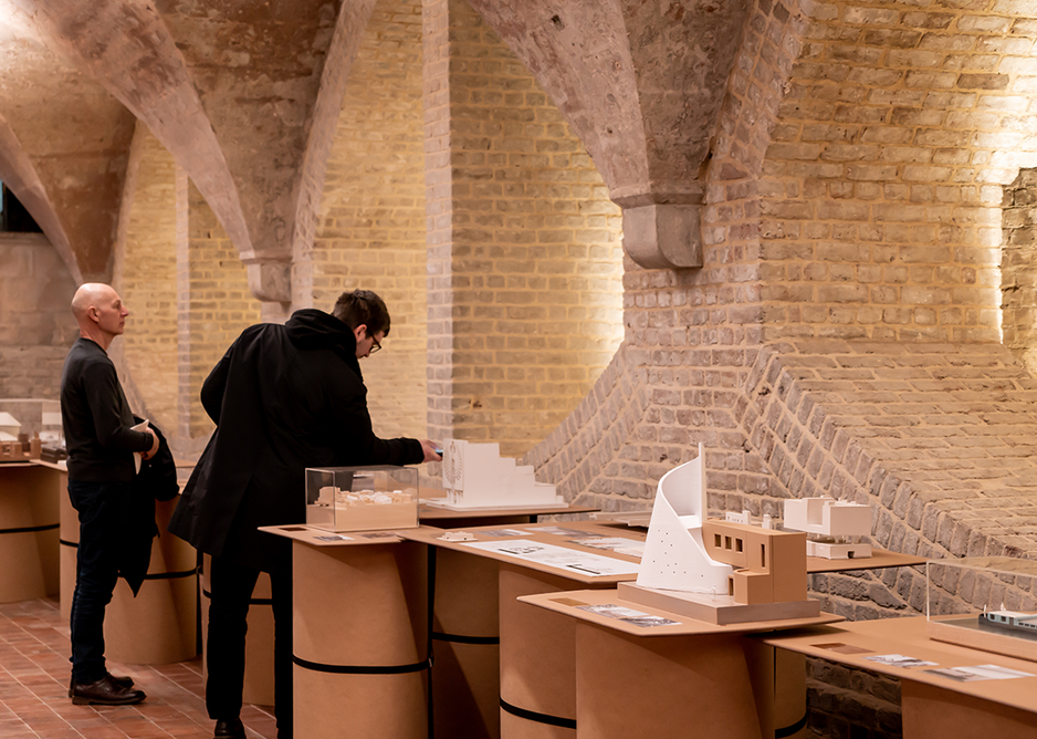 Installation view of Congregation. In the foreground is the proposed Scroll Church URC in Watford. Designed by Theis + Khan, the form is a celebration of Watford’s paper making industry in the form of a religious scroll.