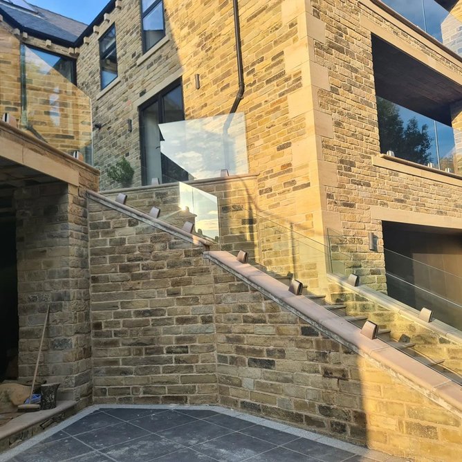 Building with a view? Then the best windbreak solution is a glass balustrade.