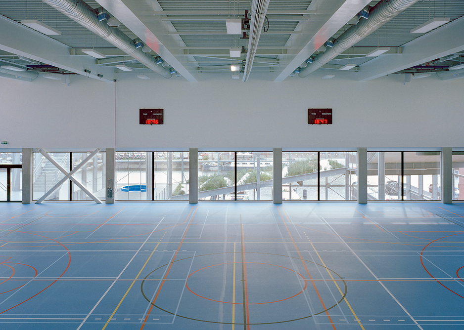 Views out from the sports hall show the inter-relationships of internal with external spaces in the building.