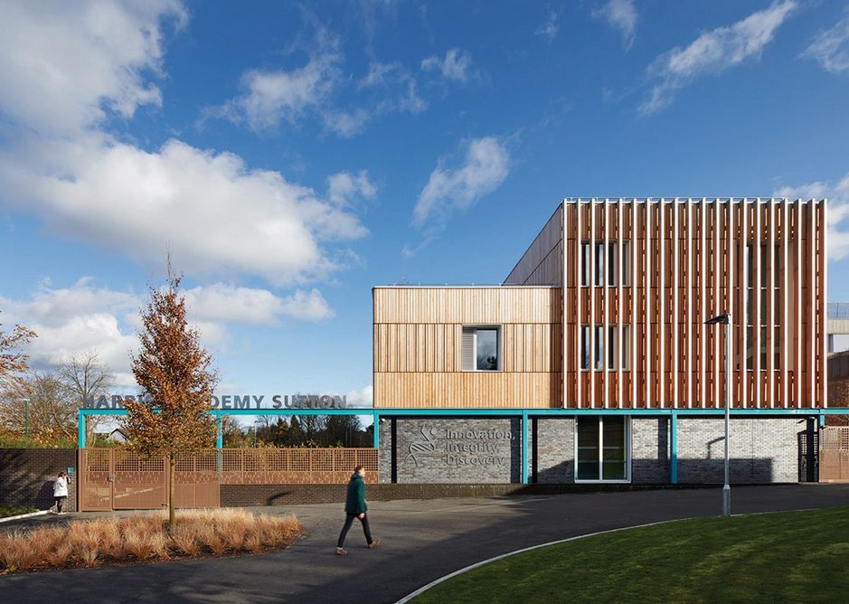 Douglas fir fins, bricks, copper cladding and aluminium windows make up the formal language of the school.