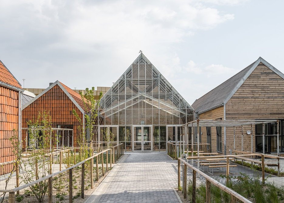 Detail view of the ‘new’ school buildings using repurposed material at Svanen Kindergarten.