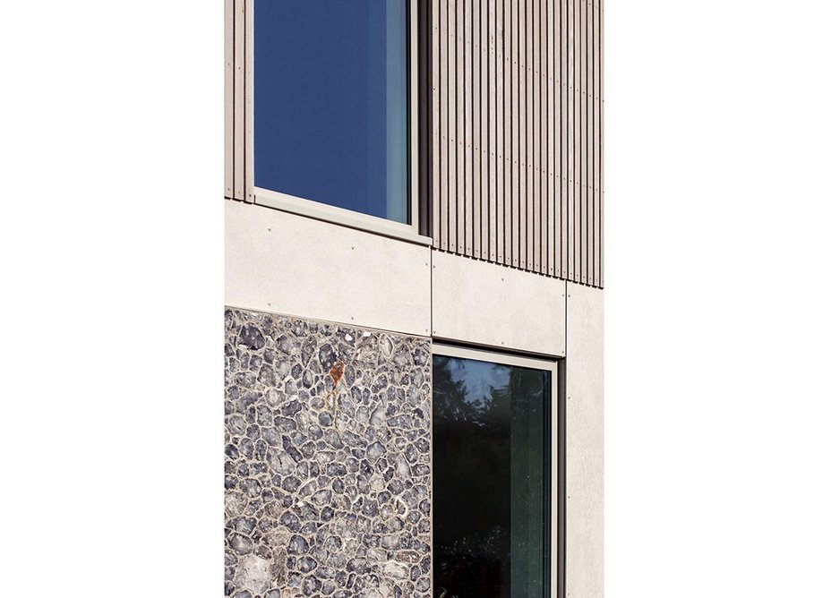 Close-up of knapped flint facade detailing on the back of the house.