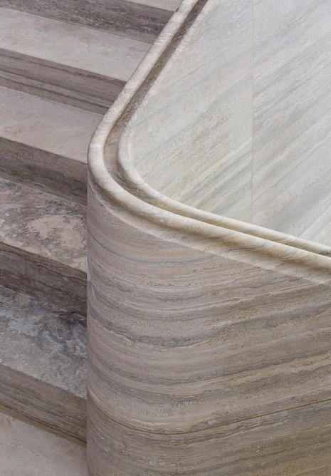 Detail of completed travertine stair designed by Jamie Fobert Architects for a residence in central London.
