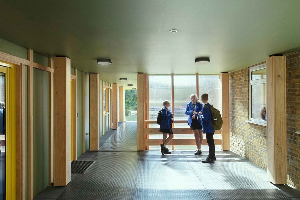 The covered walkway provides ample space for conversation, and access to the newly installed lift.