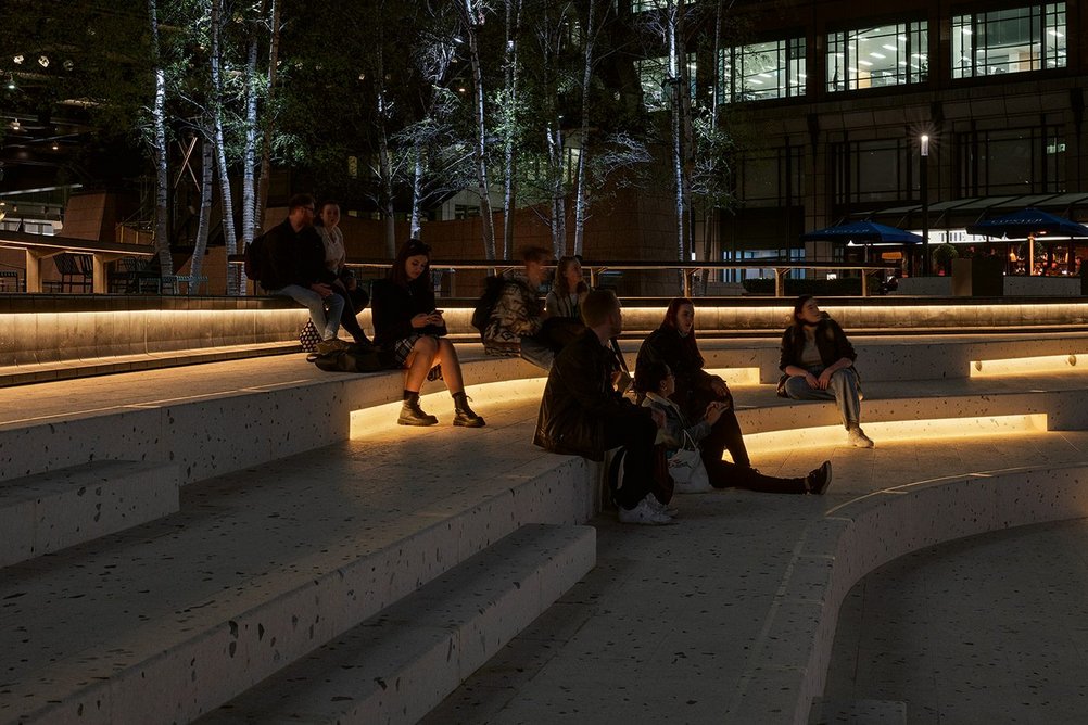 Concealed slots in the terrazzo amphitheatre seating give indirect light.
