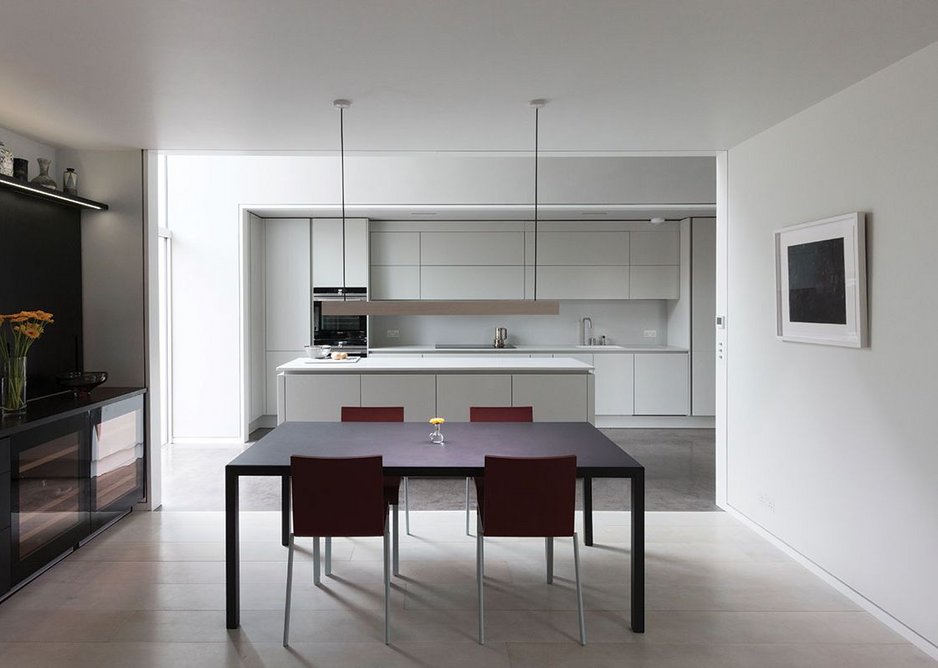 An open-plan dining room feeds off the central hallway and living room.