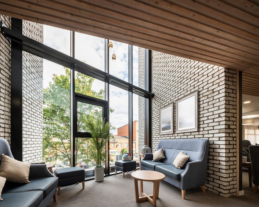 One of the double-height lounges at WGP's care home design in Burgess Park.