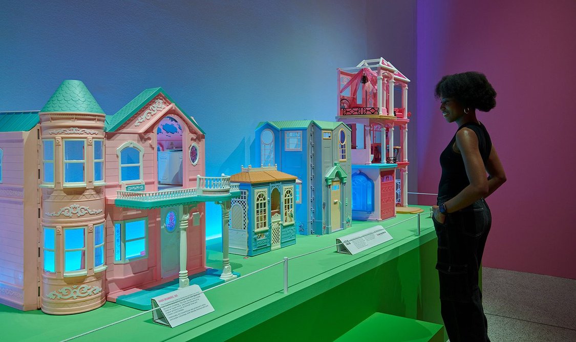 An array of dream houses at Barbie®: The Exhibition at the Design Museum.