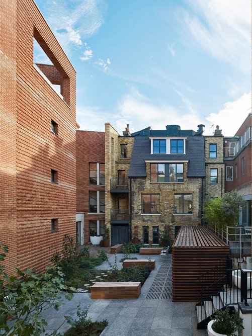 'What was a large expanse of higgledy piggledy plant space on the first-floor roof space has now been rationalised and transformed into a green urban oasis for the residents.'