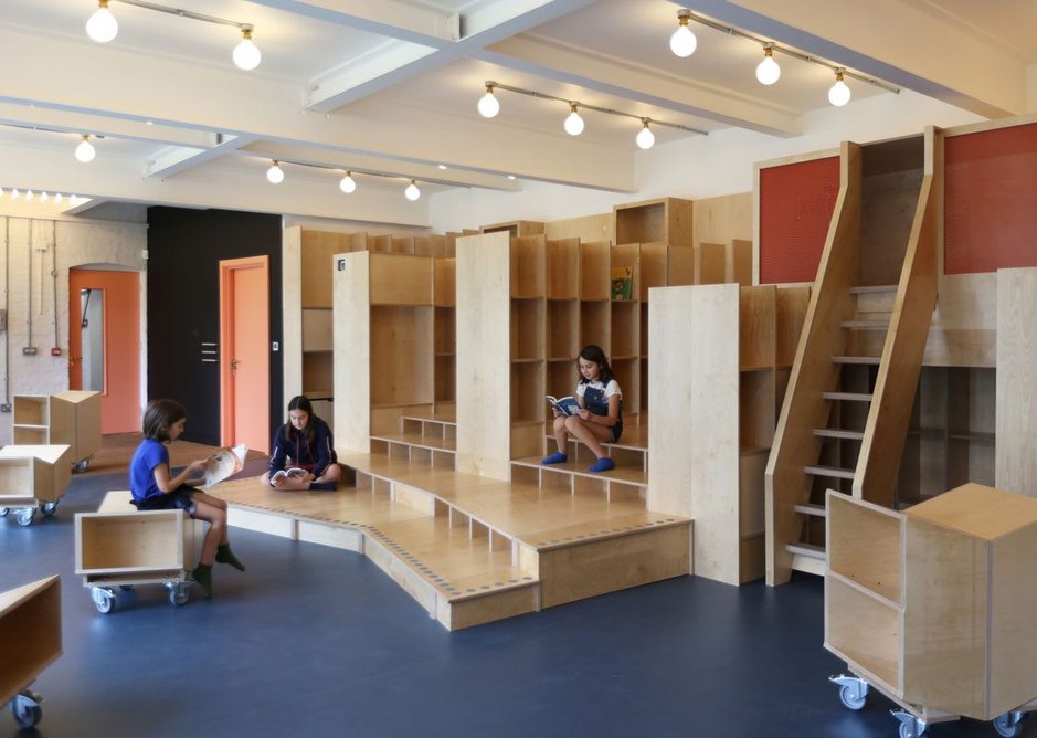 Designed by Jan Kattein Architects, the Thornhill Primary School library incorporates a variety of settings for reading including a mezzanine nook.