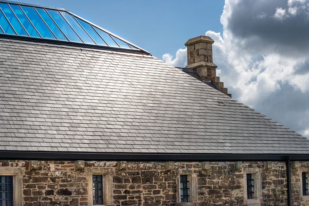 Riverstone phyllite roofing at Twelve Architects' restored 18th-century Bodmin Jail project, Cornwall.