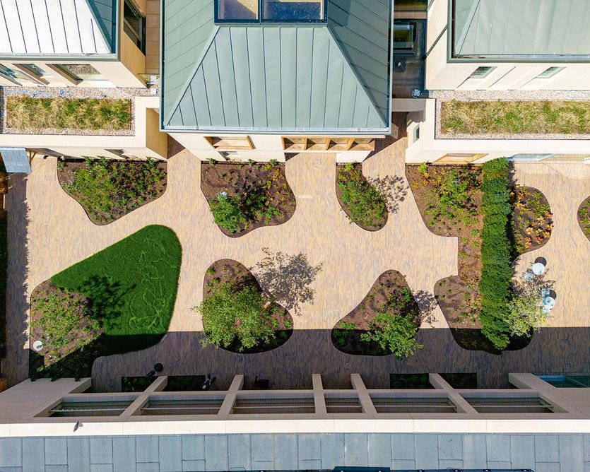Aerial view of the landscaped garden, showing the zinc roofs and skylights.