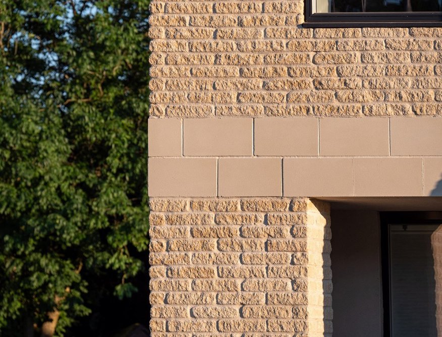 A touch of texture: tumbled reconstituted walling stone and semi-dry cast stone.