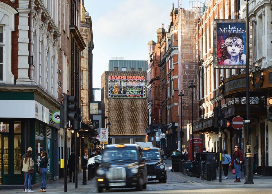 Looking north up Rupert Street, the remade Raymond Revuebar neon sign announces the reborn entertainment complex.