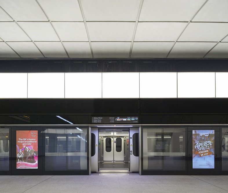 Platform screens serve multiple purposes, including information systems and digital advertising, creating a calm environment.