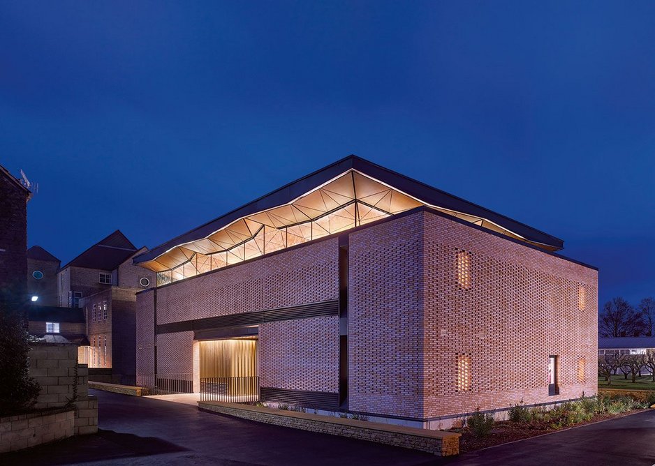 Brick is given extra texture with a pattern of protruding bricks. And it is sharpened up by the lines of the vents and some sparing windows.