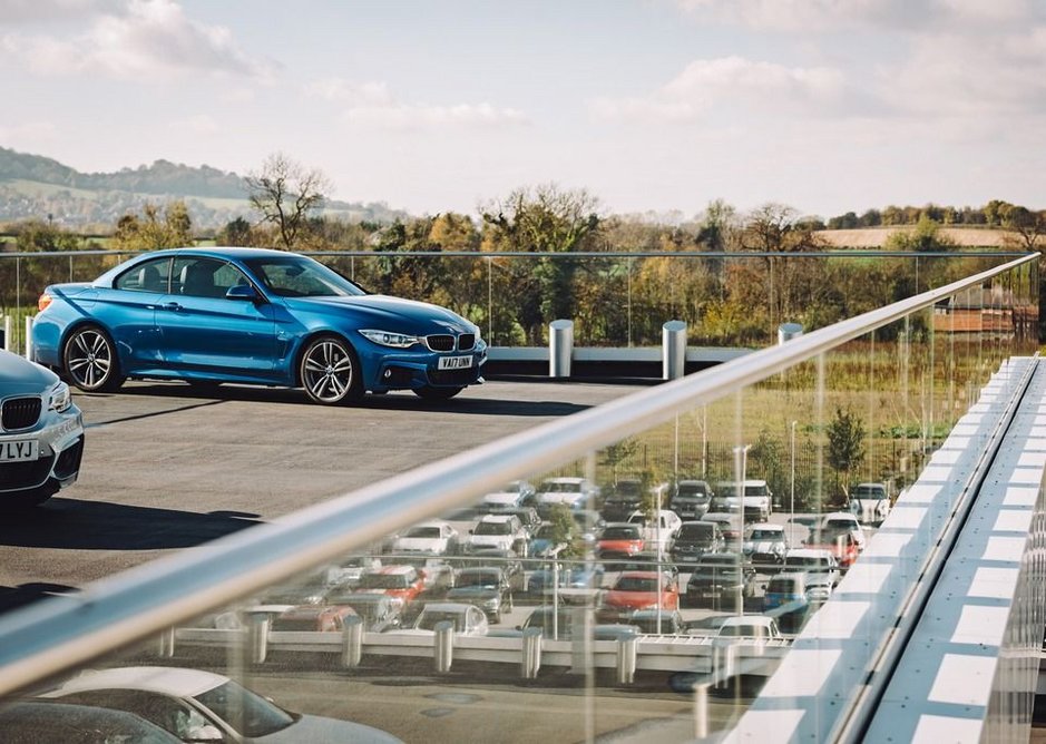 Q-railing's Easy Glass Pro balustrade system is a natural fit for the external terraces at Cotswold Cheltenham BMW.