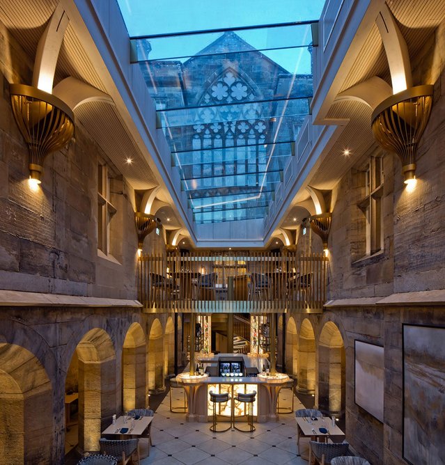 Curved timber structures, opulent brass detailing and bespoke Multi-Part Flushglaze Rooflights in the upper courtyard.