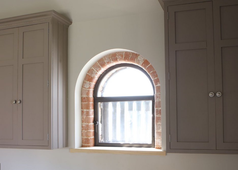 Shaped secondary glazing in a Lincolnshire barn conversion.